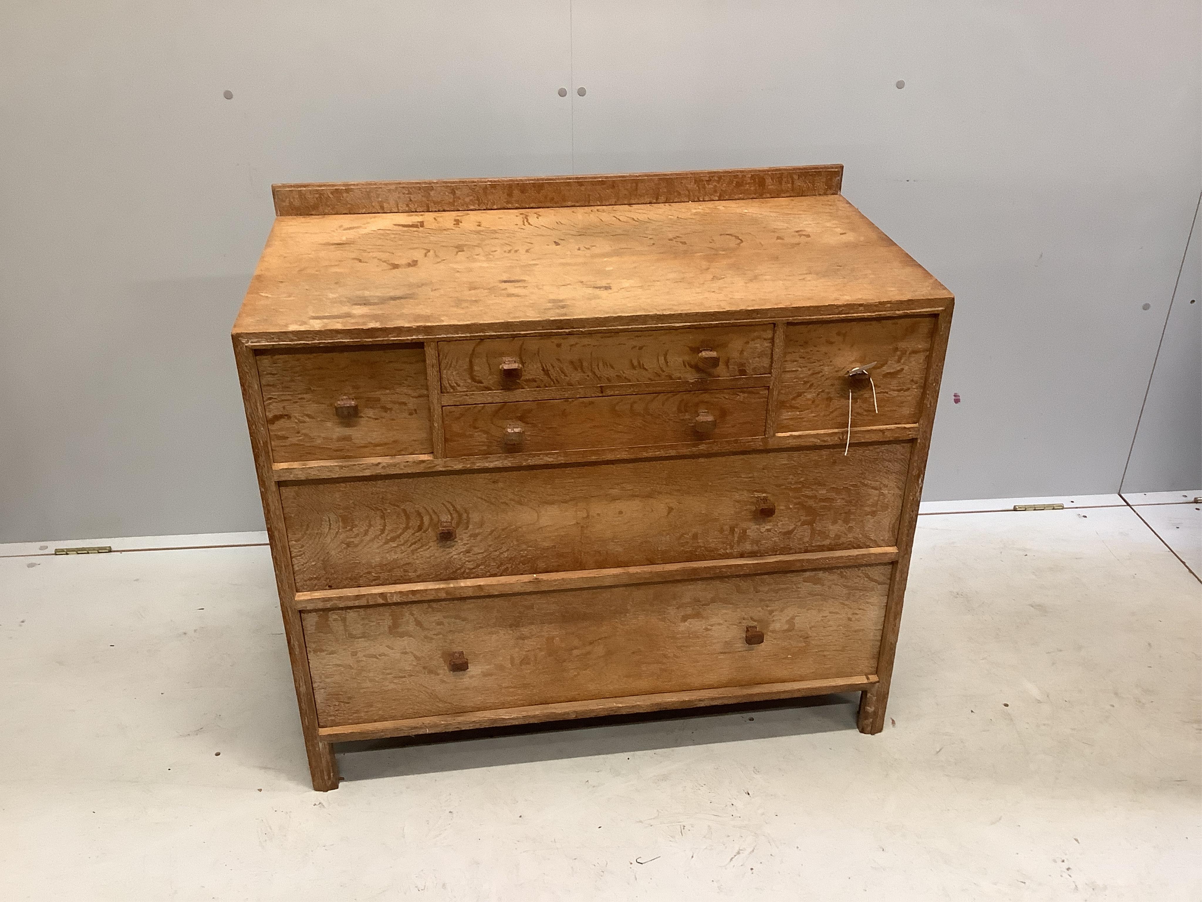 Heal & Son Ltd. A weathered oak six drawer chest, width 91cm, depth 47cm, height 80cm, and a triple dressing table mirror. Condition - fair